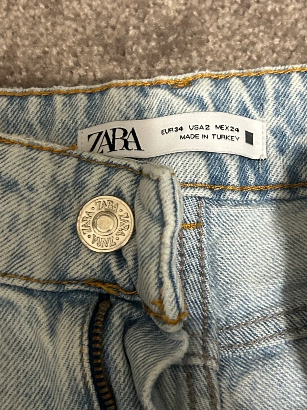 Zara Light Blue High-Rise Wide Leg Jeans with Knee Distressing